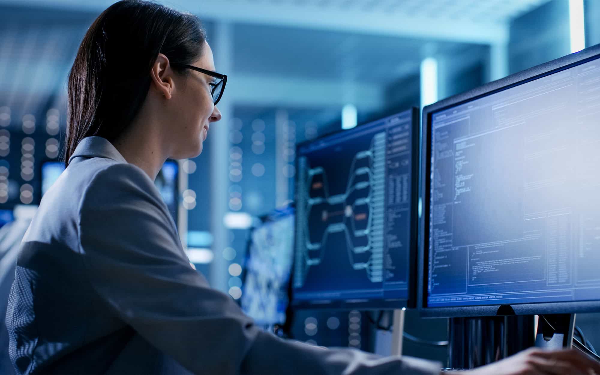 Close Up Shot Of Female It Engineer Working In Monitoring Room