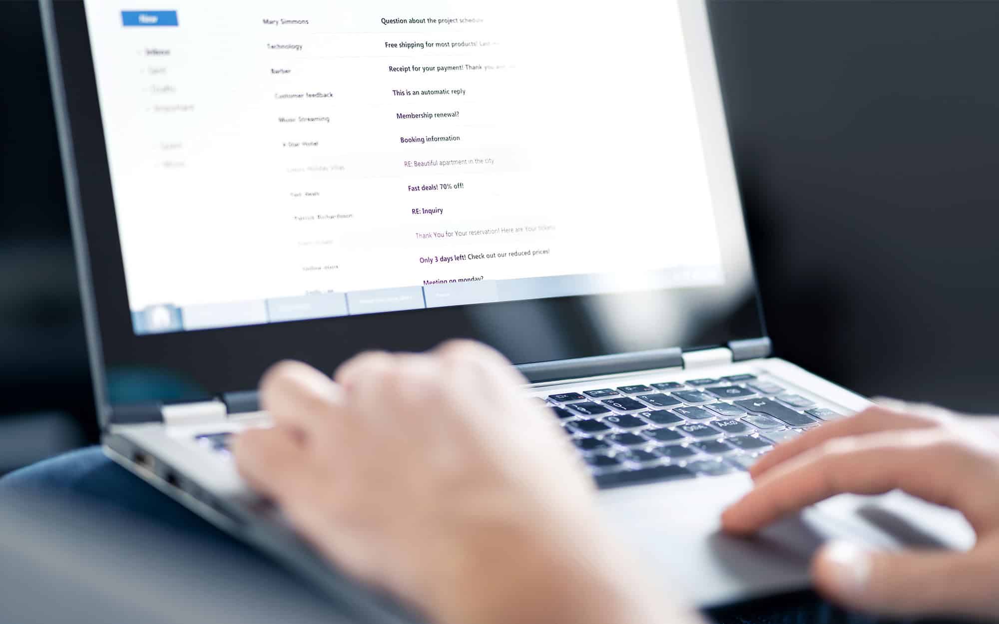 Close Up Of Someone Typing On A Laptop Writing Email